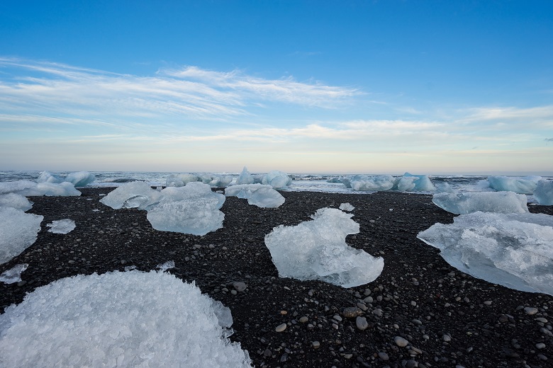 icebergs on black sand