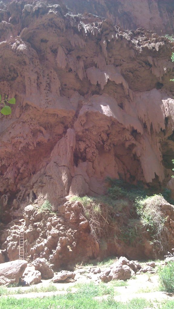 Ladders, caves, tunnels in cliff face